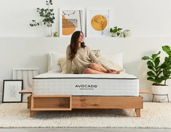 woman sitting on Avocado bed